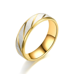 Two-tone gold and silver step edge ring with brushed finish and diagonal gold stripes