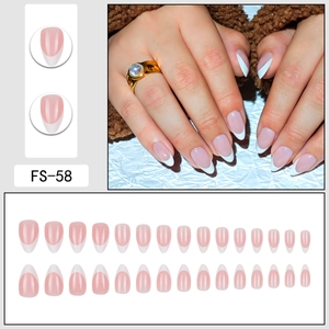 Classic white French tip press on nails in long almond shape with light nude base color