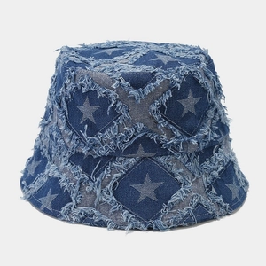 Deep blue denim bucket hat with frayed edges and light blue star patterns for women