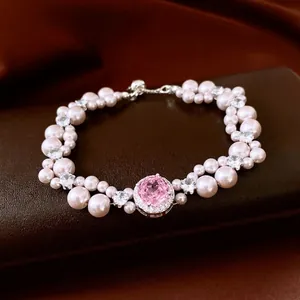 Luxury French style pearl bead bracelet with pink gemstone pendant and zircon accents