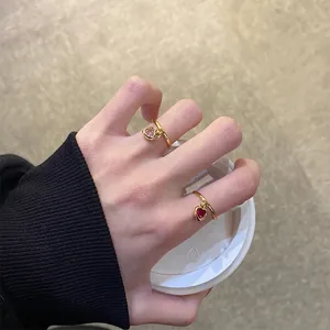 Adjustable gold plated rings with pink and red heart zirconia charms for women