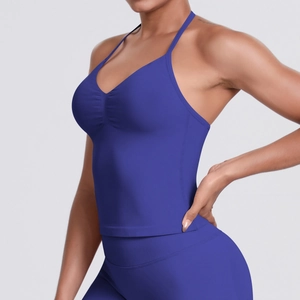 Detail of dark blue seamless yoga top with pleated V-neck and thin shoulder straps