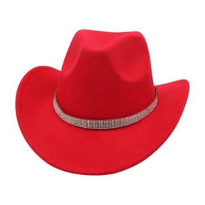 Close-up of red felt western cowboy hat with a shimmering silver rhinestone band
