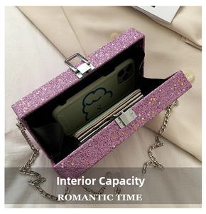 Internal view of purple glitter box bag showing capacity for a smartphone
