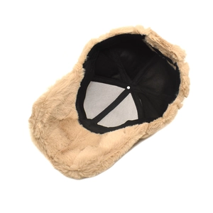 Light brown faux fur baseball cap for women with warm lining in a top-down view