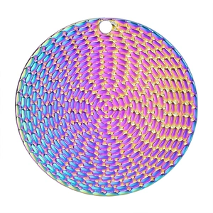 Macro view of a circular stainless steel pendant with rainbow plating and diamond texture