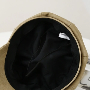 Khaki leather newsboy cap for women featuring adjustable inner drawstring and lining