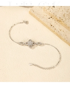Detail of silver floral bracelet with sparkling zircon and adjustable lobster clasp