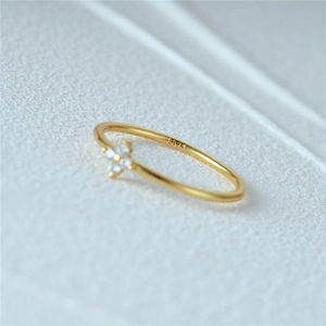 Detail shot of golden S925 silver ring featuring a sparkling zircon flower cluster
