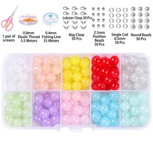 Detailed DIY jewelry kit with 8mm glass beads, colorful accessories, and crafting tools