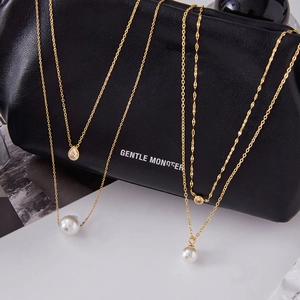 Collier double rang en acier inoxydable doré avec perles et pendentifs en zircon