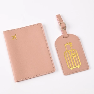 Pink PU leather travel set with gold foil airplane and luggage tag icons