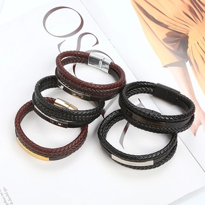 Collection of braided leather bracelets with gold, silver, and black magnetic clasps