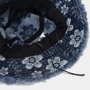 Denim bucket hat with white flower jacquard and trendy frayed edges for sun protection