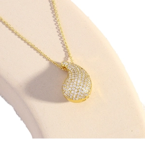 Luxurious gold-plated teardrop necklace featuring micro-paved cubic zirconia pendant