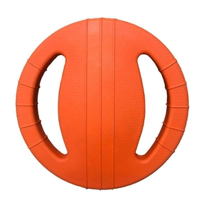 Macro shot of orange durable pet flyer toy with symmetrical handles and anti-slip texture