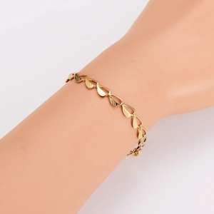 Minimalist gold stainless steel leaf bracelet with textured hollow-out leaf links for women