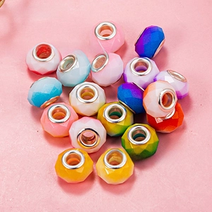 Close-up of colorful faceted crystal beads with silver metal cores for DIY jewelry making