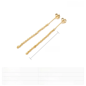 Macro detail of 18K gold plated stainless steel long chain drop earrings showing sleek finish