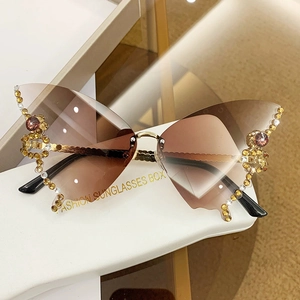 Fashion butterfly rimless sunglasses with brown gradient lenses and rhinestone accents