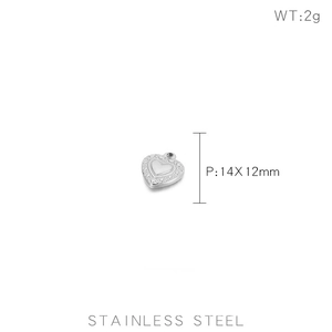 Detail view of 14x12mm stainless steel heart pendant with engraved inner heart pattern