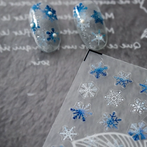 5D embossed snowflake nail art stickers with blue and white winter frost patterns