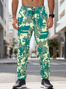 Detail of cargo pants showing green digital camo pattern and adjustable drawstring waist