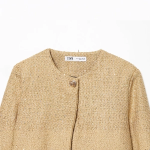 Giacca in tweed dorato da donna con trama scintillante e bottoni a rilievo dorati