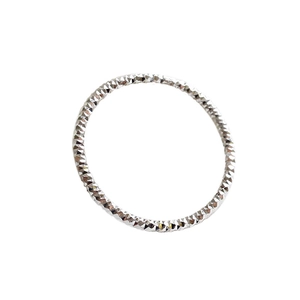 Sparkling S925 sterling silver diamond-cut thin band ring with a faceted geometric texture