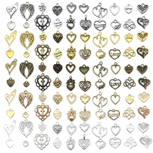 Mixed vintage alloy heart charms and wing pendants for DIY jewelry in four metallic finishes