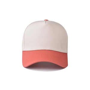 Detail of cotton baseball cap with cream crown and contrasting coral orange brim and top button