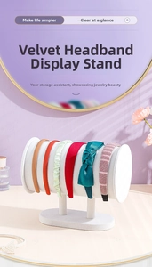 Close-up of T-shaped white velvet headband holder featuring a double pillar support base