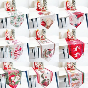 Collection of festive cotton Christmas table runners featuring Santa and reindeer designs