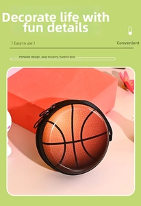 Detailed close-up of portable basketball coin purse with convenient wrist strap and zipper