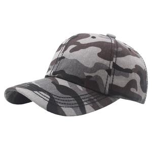 Detailed view of gray-brown camo baseball cap showing durable canvas fabric and reinforced stitching