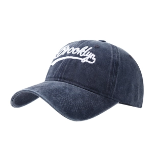 Vintage washed navy blue baseball cap with white Brooklyn embroidery on front