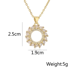 Detail showing gold wreath pendant dimensions 2.5cm by 1.9cm with weight 5g specs
