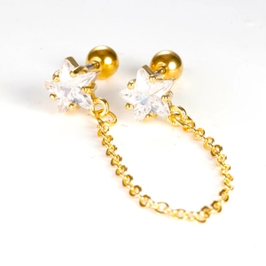 Star-shaped gold earrings with zircon stones and chain connector for double piercing