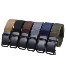 Row of six canvas belts with automatic buckles in khaki, black, brown, and navy colors