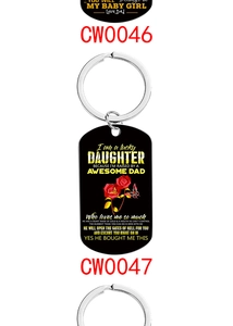 Detail view of custom stainless steel keychains with rose print and daughter message
