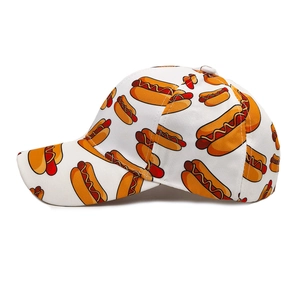 White baseball cap with all-over hot dog pattern and curved brim for outdoor sun protection