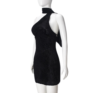 Detailed view of black mini dress featuring jacquard animal texture and halter neck