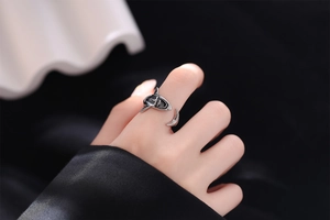 Macro view of adjustable great white shark ring with antique silver oxidized finish