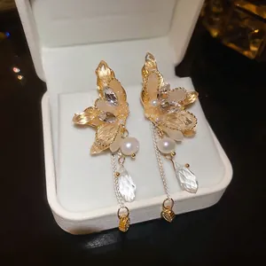 Elegant butterfly tassel earrings with freshwater pearls and champagne crystals in a gift box