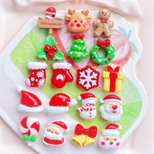 Set of 18 colorful Christmas resin charms featuring Santa, reindeer, and snowflakes