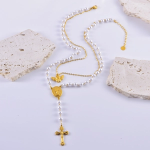 Vintage double layer necklace with pearls, cross pendant, and turquoise stone accents
