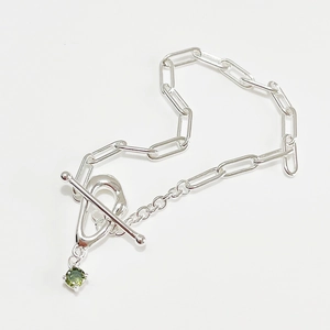 Sterling silver rectangle link bracelet with green gemstone charm and OT clasp toggle