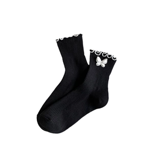 Japanese JK style black mid-calf cotton socks with white frill trim and bow tie detail