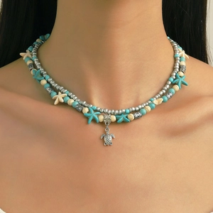 Collier multicouche bohème avec perles turquoise, étoile de mer et pendentif tortue