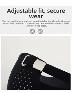 Detail of adjustable silver buckle and breathable eyelets on navy blue baseball cap